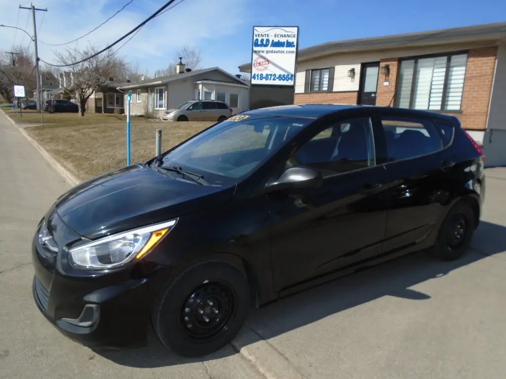 Side view of the 2016 Hyundai Accent, showcasing its streamlined profile and clean body lines.