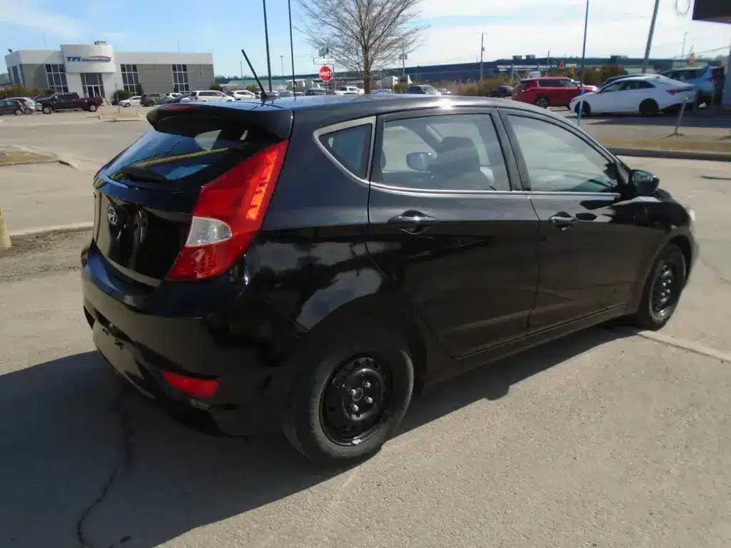 Side view of the 2016 Hyundai Accent, showcasing its streamlined profile and clean body lines.