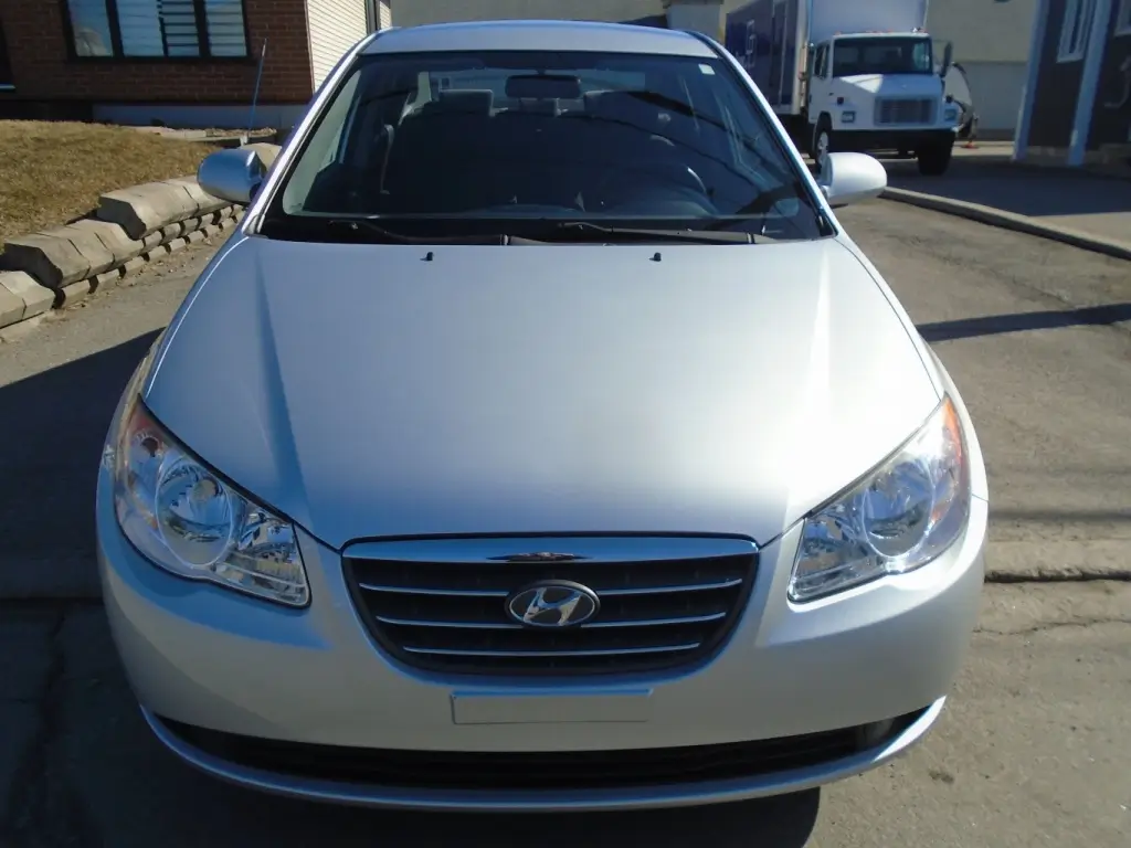 Front view of the 2009 Hyundai Elantra, showcasing its grille, headlights, and compact design.